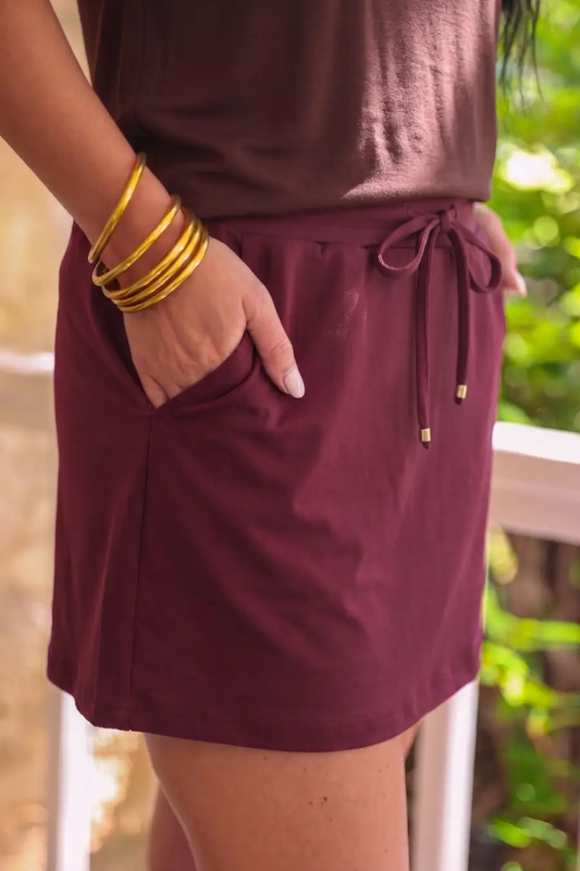 Preorder Solid Burgundy Skort With Side Pockets And Built In Shorts Drawstring by Jess Lea