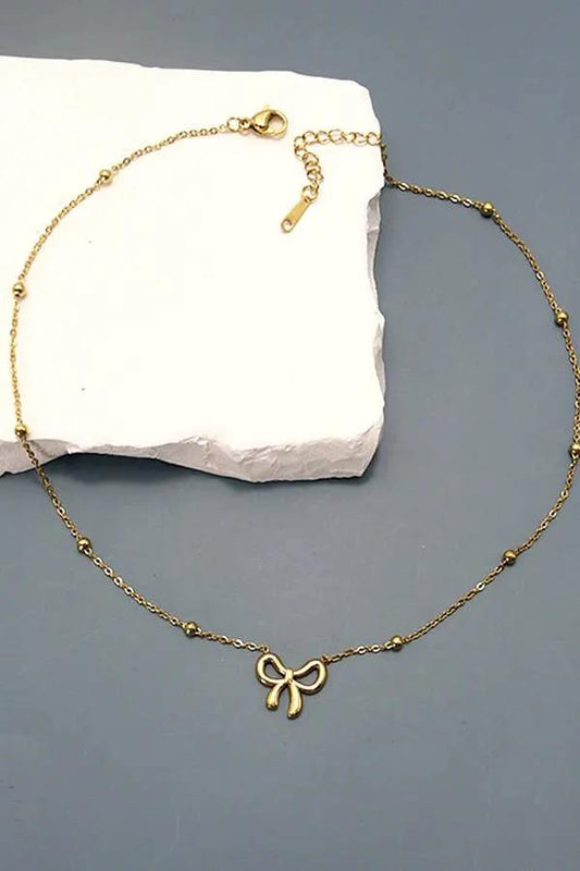 Gold Bow Necklace in 18K Dipped Stainless Steel TARNISH FREE by JOSSLYN by Wall to Wall