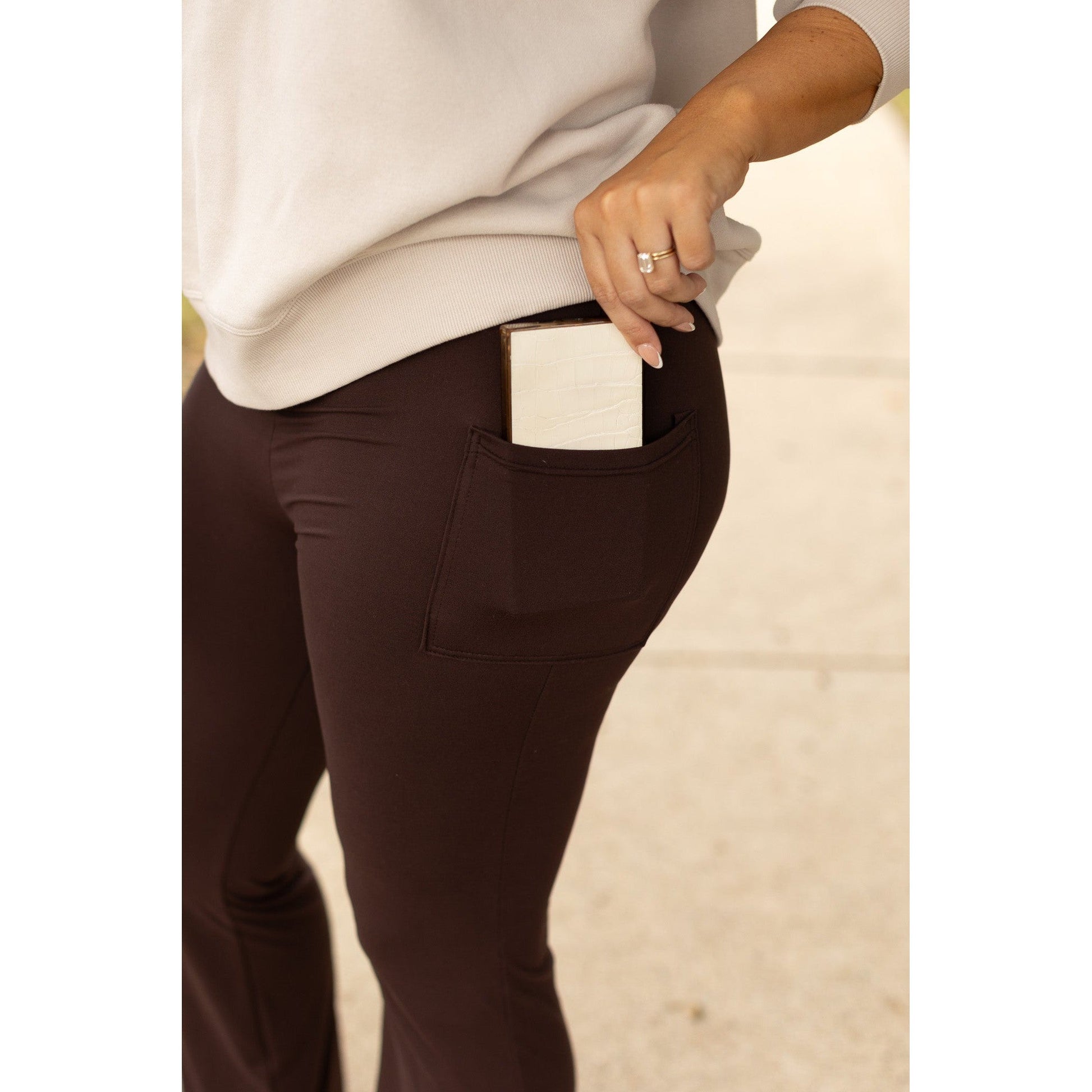 High-waisted brown bootcut leggings with pockets by Julia Rose, Julia Rose women’s brown flared leggings lifestyle image