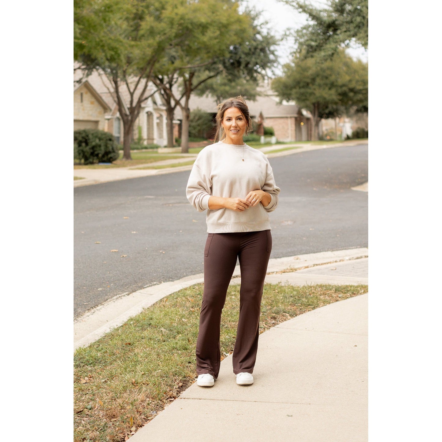 High-waisted brown bootcut leggings with pockets by Julia Rose, Julia Rose women’s brown flared leggings lifestyle image