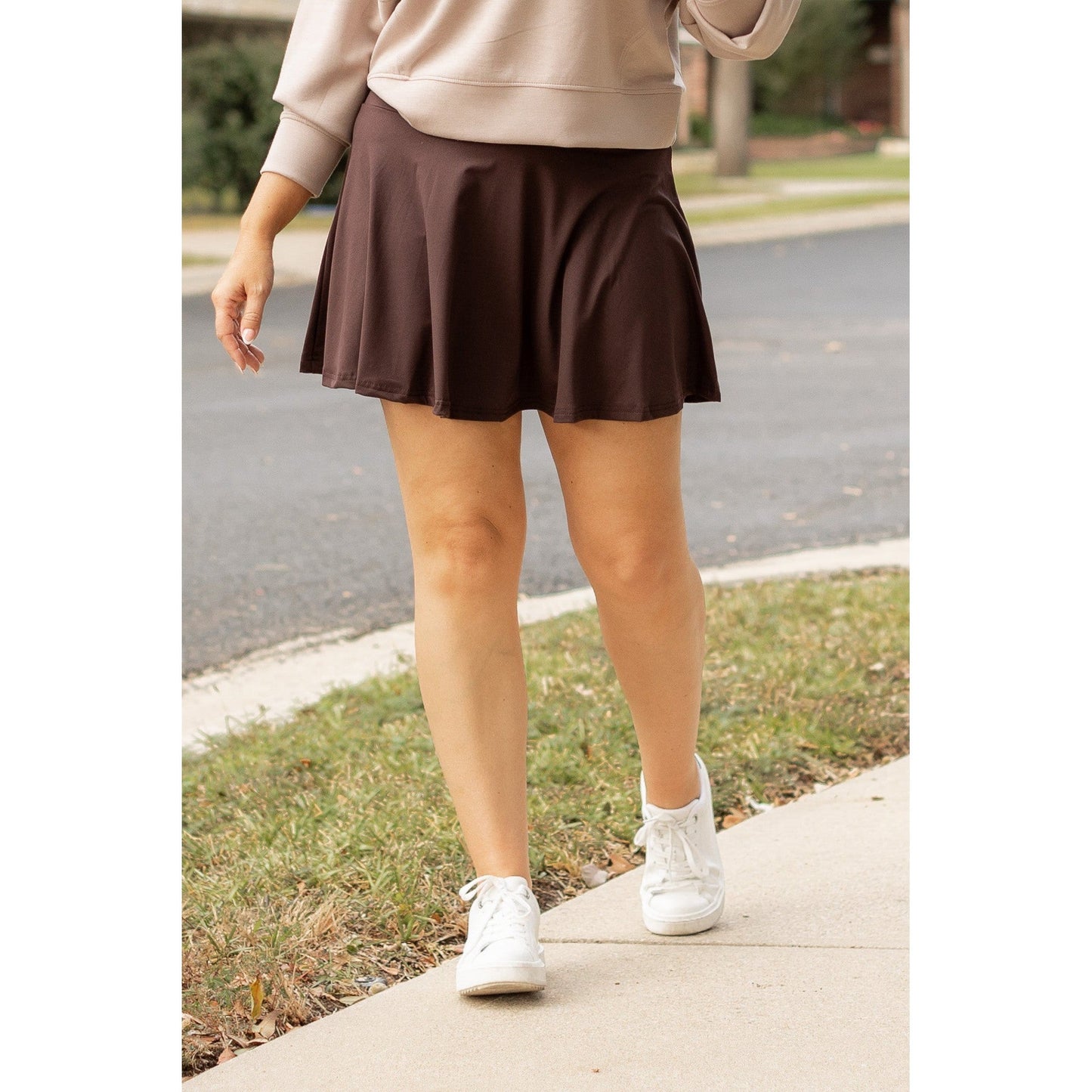 Stretchy brown Julia Rose skort styled for casual wear