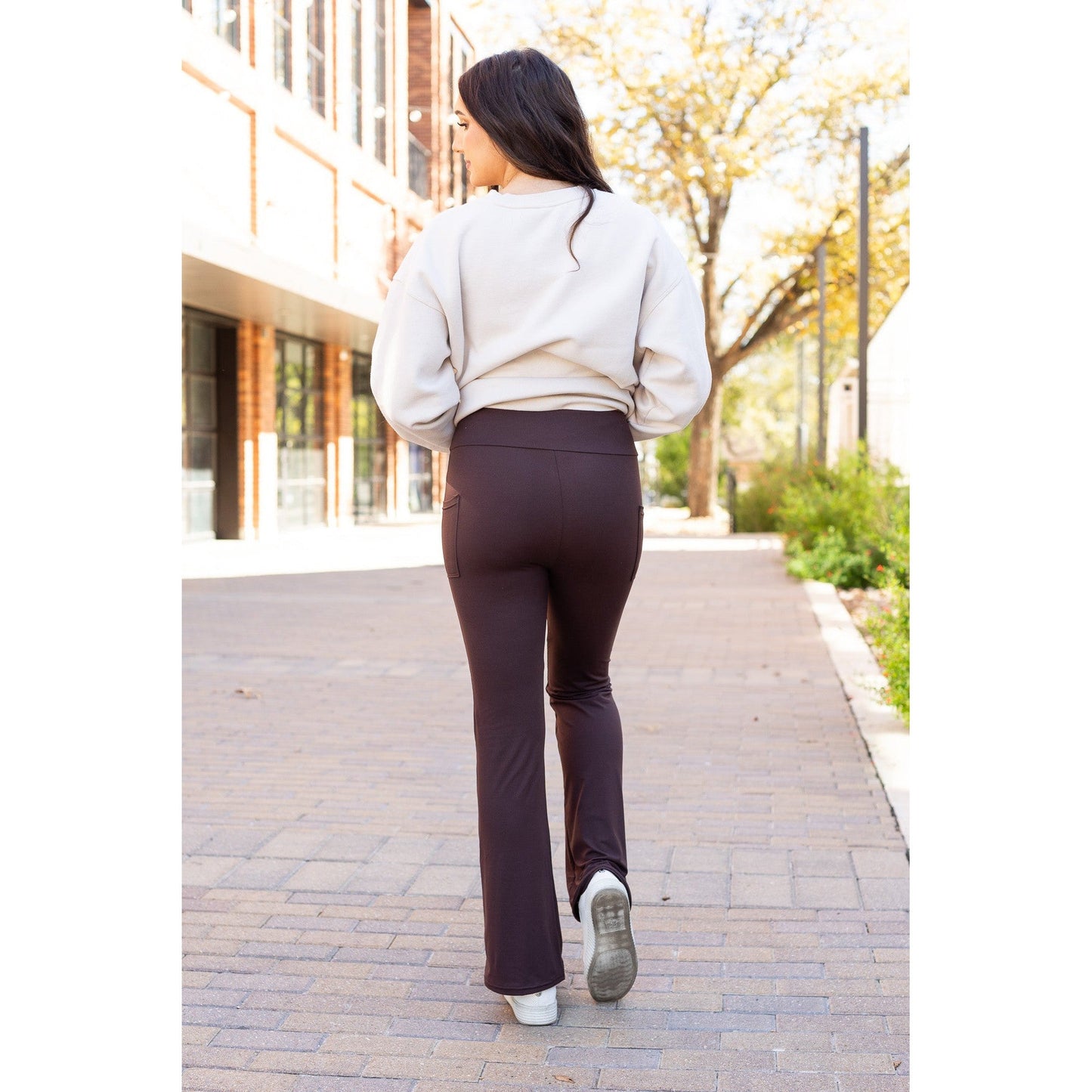 High-waisted brown bootcut leggings with pockets by Julia Rose, Julia Rose women’s brown flared leggings lifestyle image