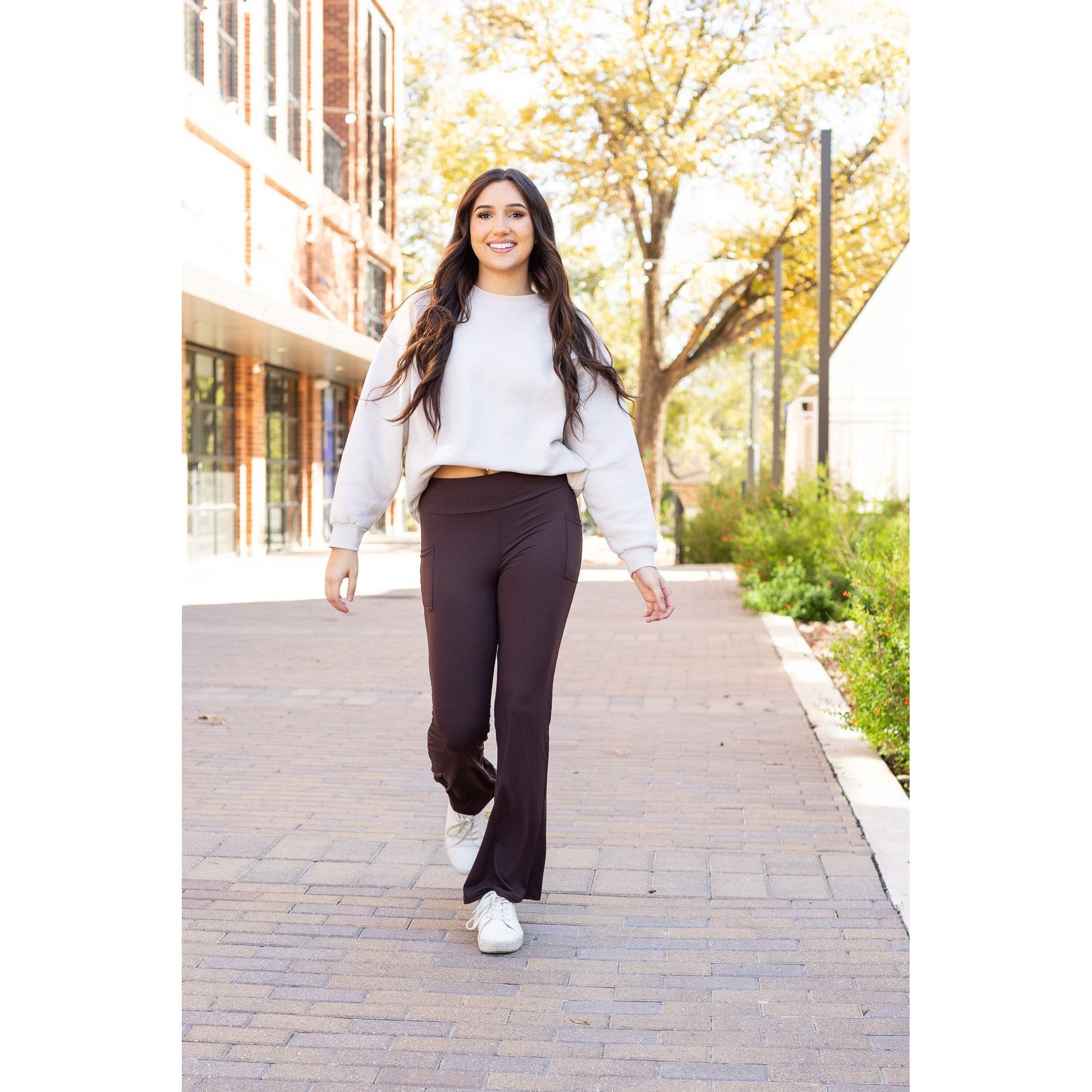 High-waisted brown bootcut leggings with pockets by Julia Rose, Julia Rose women’s brown flared leggings lifestyle image