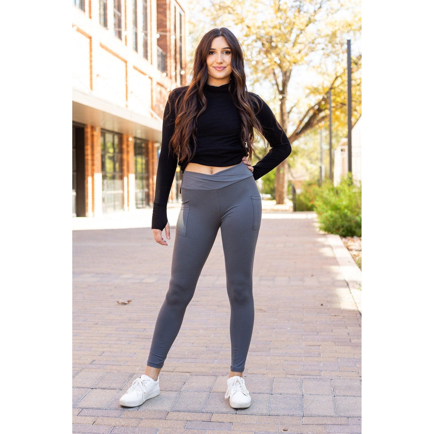 High-waisted charcoal crossover leggings with pockets by Julia Rose, Julia Rose women’s charcoal full length leggings lifestyle image