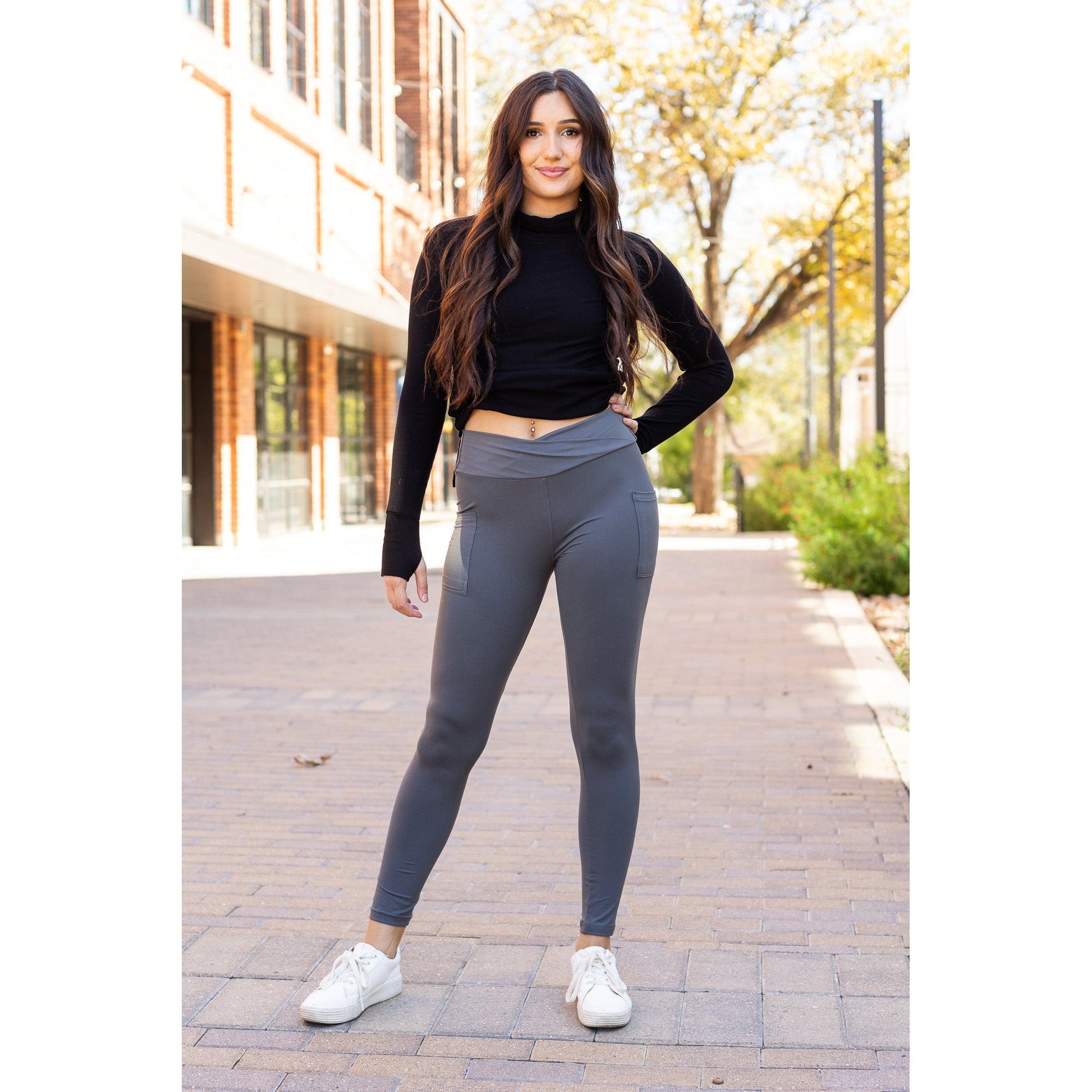 High-waisted charcoal crossover leggings with pockets by Julia Rose, Julia Rose women’s charcoal full length leggings lifestyle image
