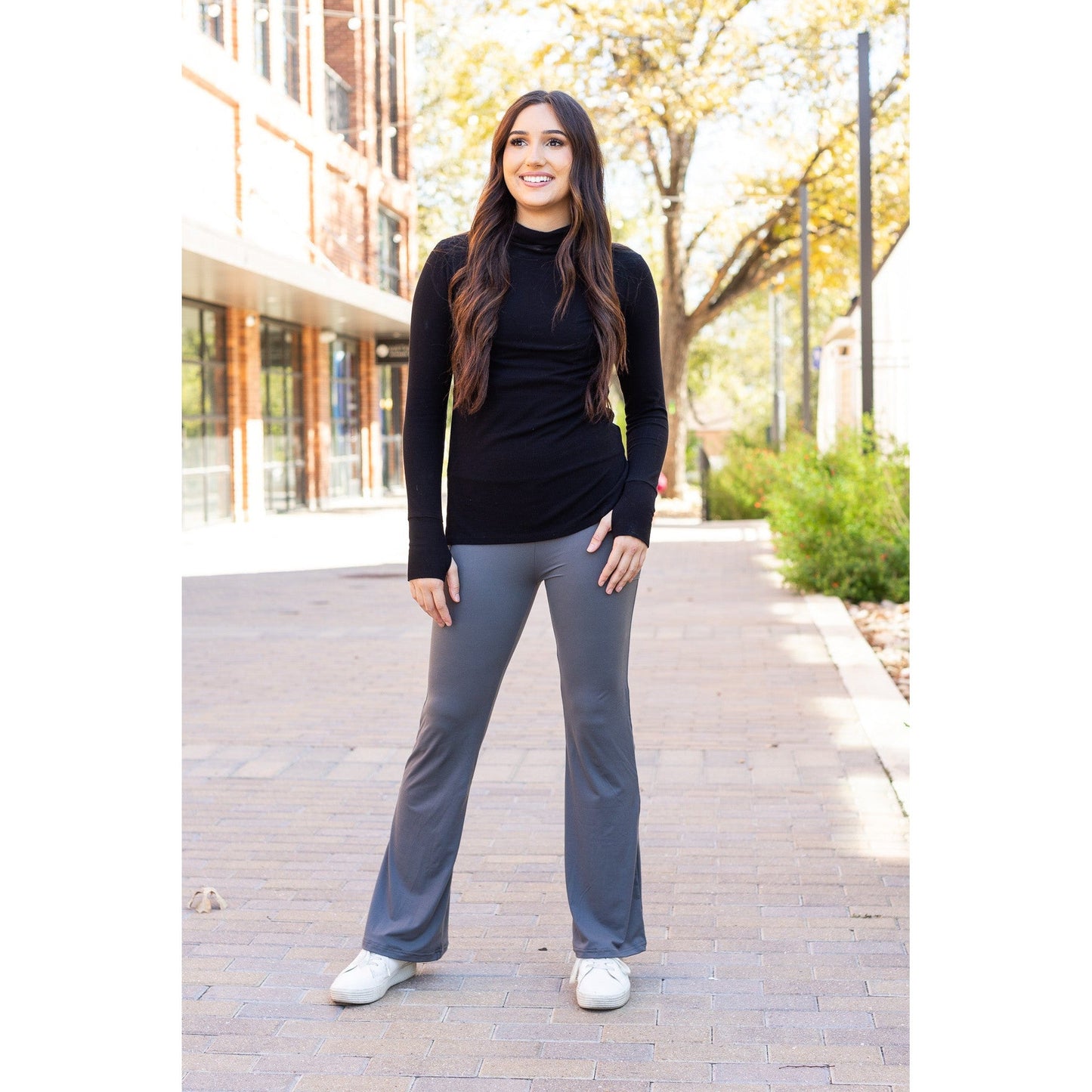 High-waisted charcoal bootcut leggings with pockets by Julia Rose, Julia Rose women’s charcoal flared leggings lifestyle image