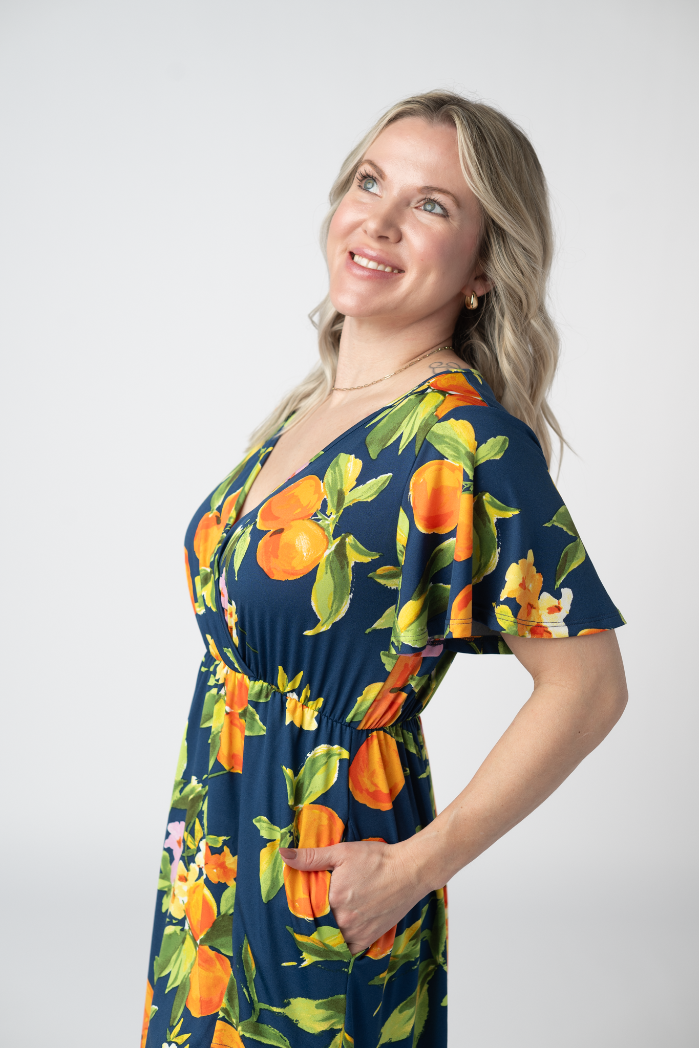Harley Navy Citrus High Low Dress With Crossover Neckline And Pockets by Michelle Mae