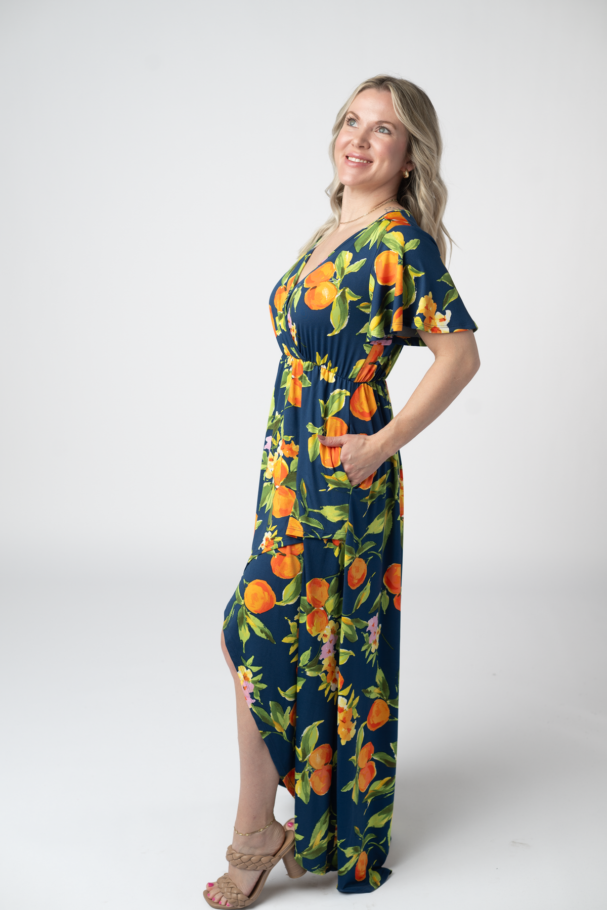 Harley Navy Citrus High Low Dress With Crossover Neckline And Pockets by Michelle Mae