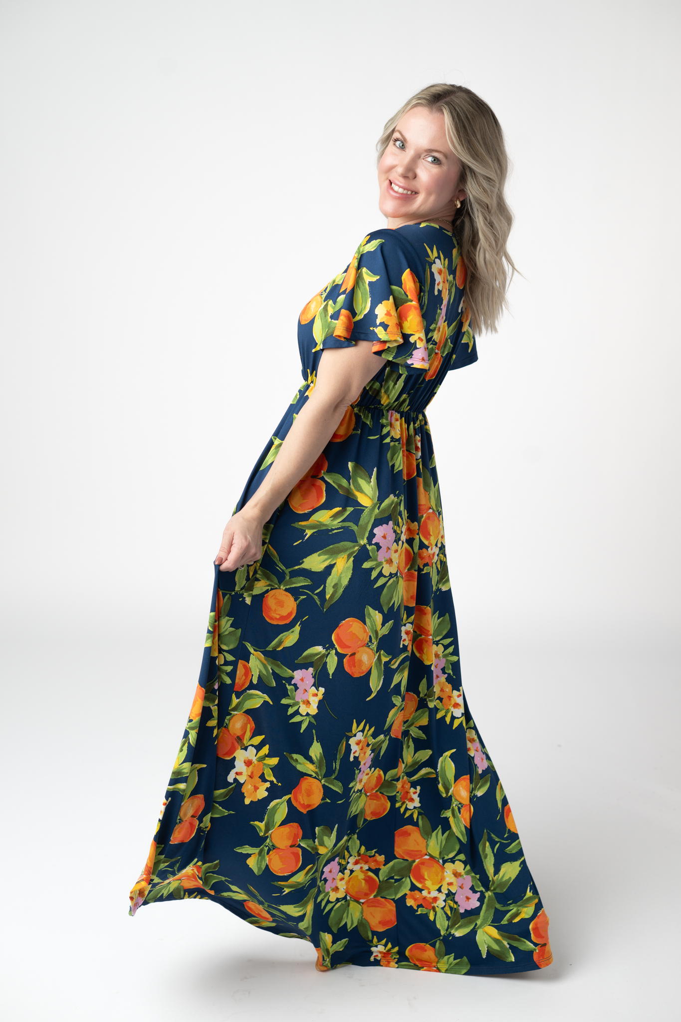 Harley Navy Citrus High Low Dress With Crossover Neckline And Pockets by Michelle Mae