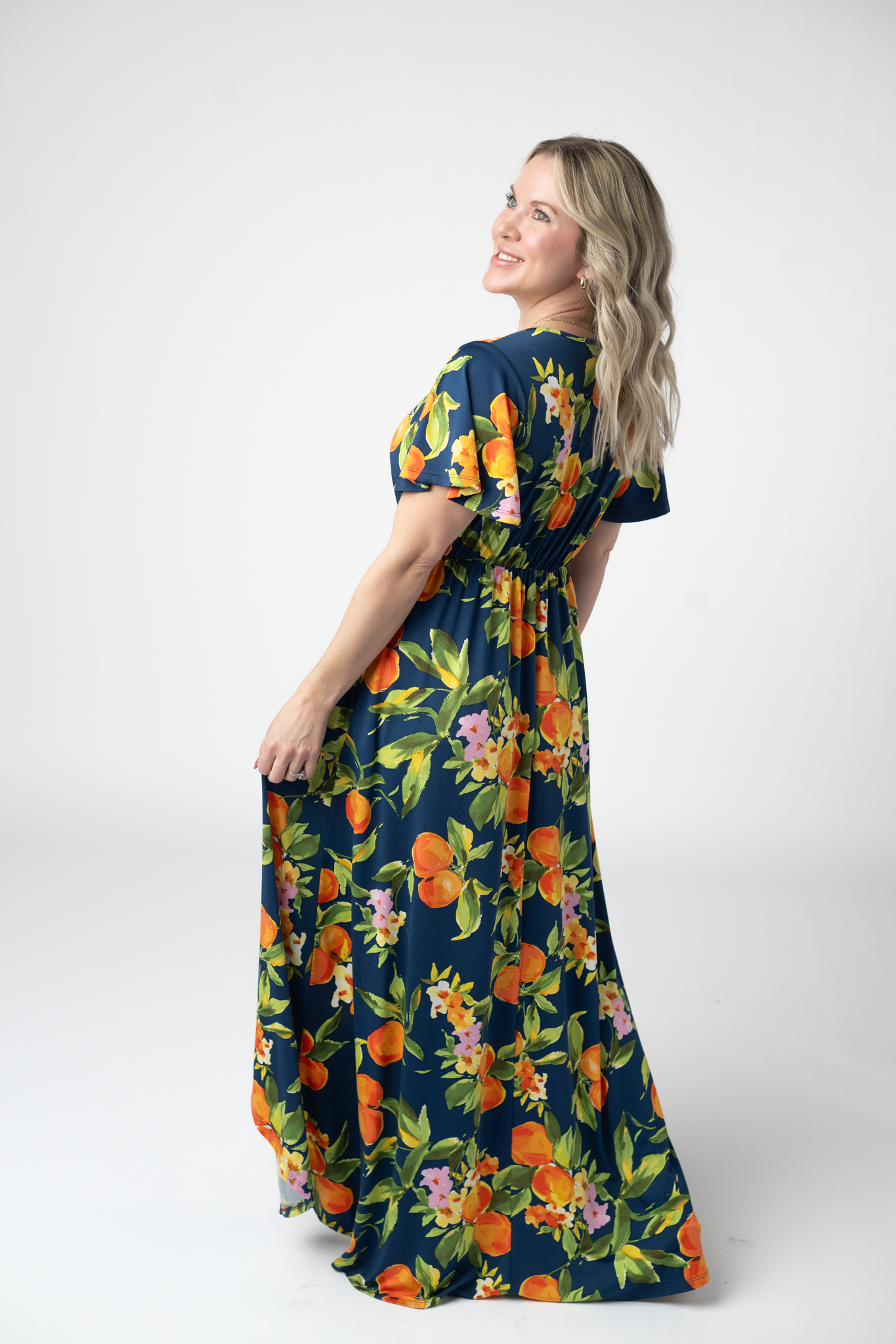 Harley Navy Citrus High Low Dress With Crossover Neckline And Pockets by Michelle Mae