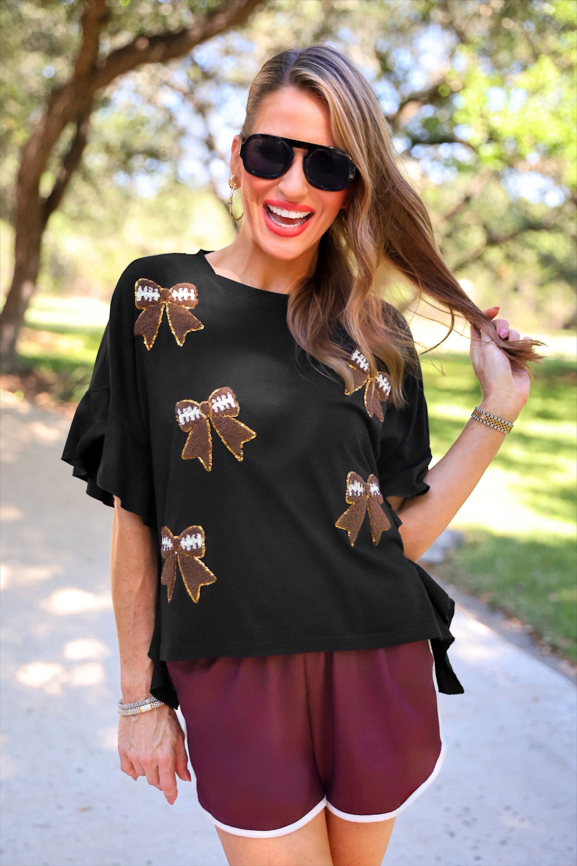 PREORDER- Sideline Sparkle Ruffle Top- Black by Jess Lea