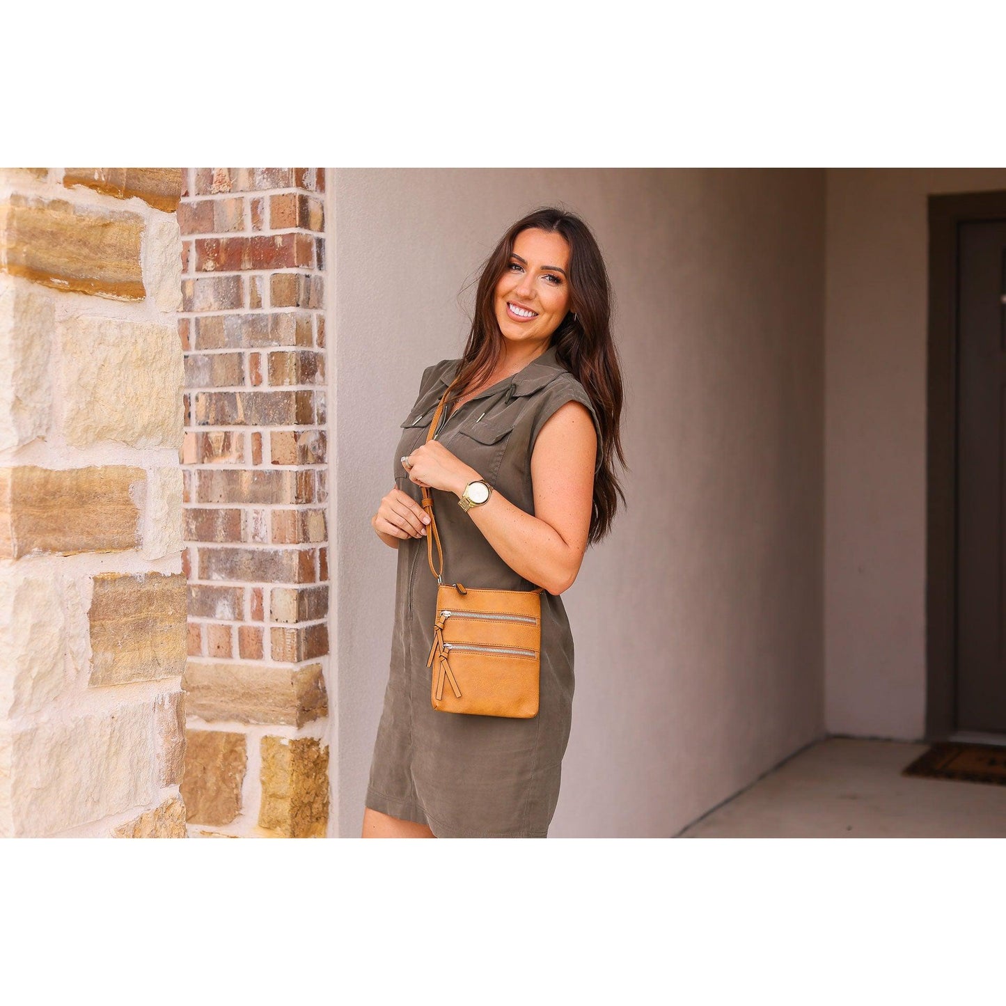 Envelope style crossbody bag with multiple zipper compartments