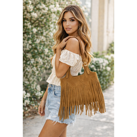 fringe shoulder bag with braided straps styled